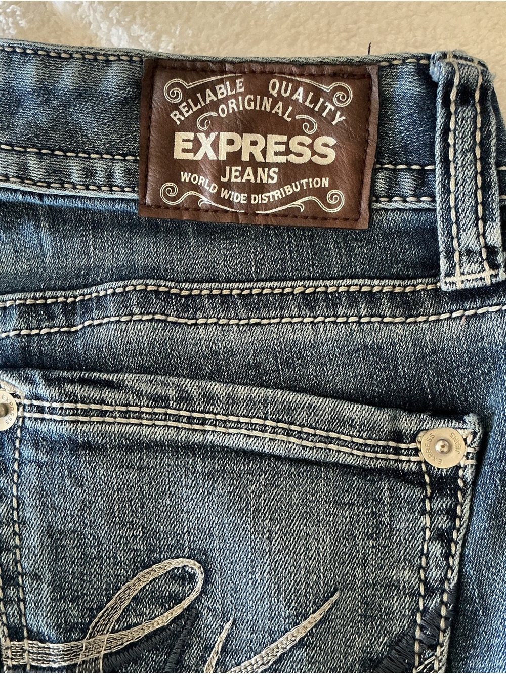 Express Blue Denim Jeans with Brown Leather Logo Patch